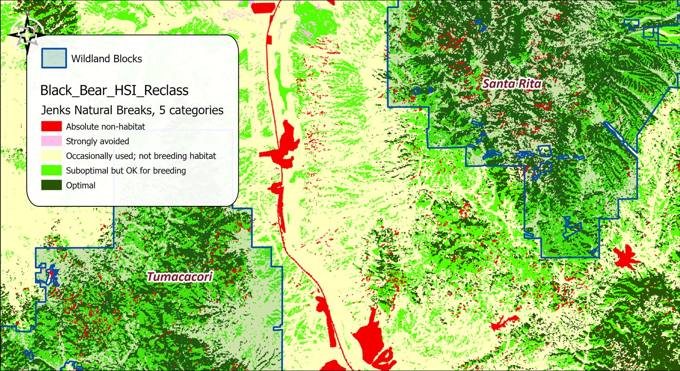 The re-weighted black bear model in five natural-breaks classes over the two wildland blocks: optimal habitat in dark green on the wooded uplands, suboptimal in bright green, occasionally used in pale yellow across the valley, strongly avoided in pink and absolute non-habitat in red along the interstate and around the towns