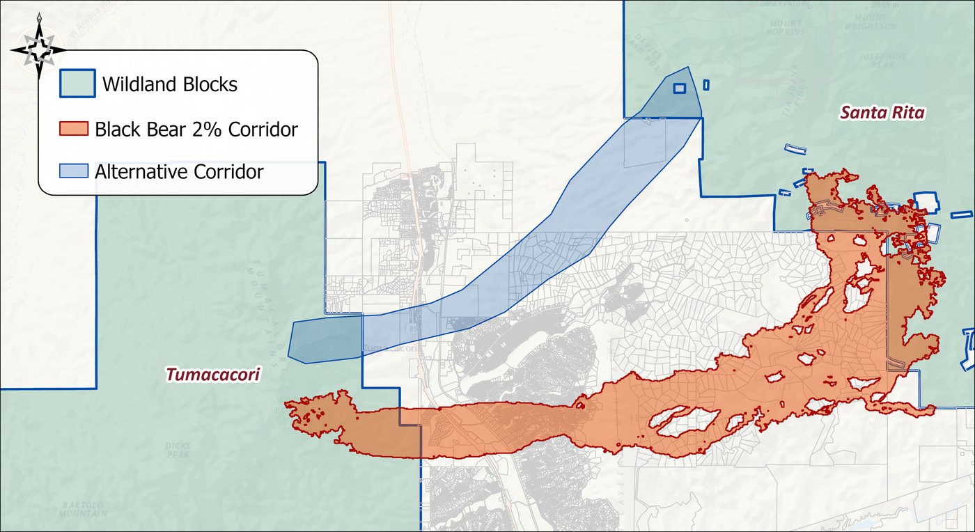 The black bear 2 percent corridor in orange along the southern highlands, and a proposed alternative corridor in blue: a smooth band of roughly constant width running from the Tumacacori block northeast across the valley and Highway 89 to the northwest corner of the Santa Rita block