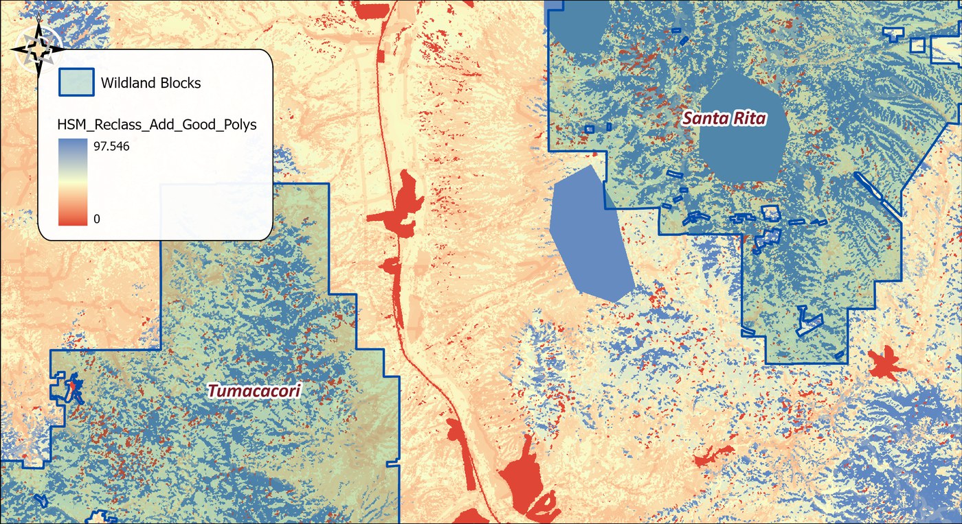 The modified model HSM_Reclass_Add_Good_Polys, identical to the original everywhere except inside the three polygons, which are now uniform blue blocks of high suitability against the surrounding patchwork