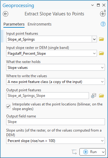 The Extract Slope Values to Points pane: Input point features Slope_at_Springs, Input slope raster or DEM Flagstaff_Percent_Slope, What the raster holds set to Slope values, Where to write the values set to A new point feature class (a copy of the input), Output point features Slope_at_Springs_Slope, Interpolate values checked, Output field name Slope, Slope units Percent slope (rise/run &times; 100).