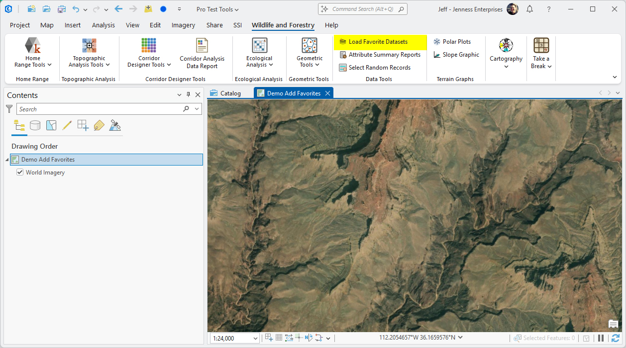 ArcGIS Pro with the Wildlife and Forestry ribbon tab open and the Load Favorite Datasets button highlighted in the Data Tools group. The Contents pane lists a single layer, World Imagery, and the map shows satellite imagery of canyon country