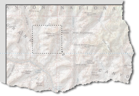 Part of a layout showing a topographic map, with a dashed square being dragged out on it and the crosshair cursor at its lower right corner