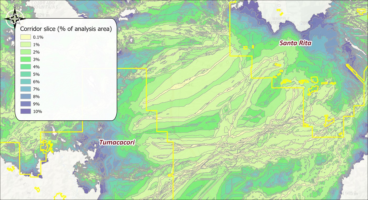 Every corridor slice of every facet drawn at once over a topographic base: nested bands from pale yellow at 0.1 percent through greens to blue-violet at 10 percent, covering nearly the whole landscape between and around the two wildland blocks outlined in yellow