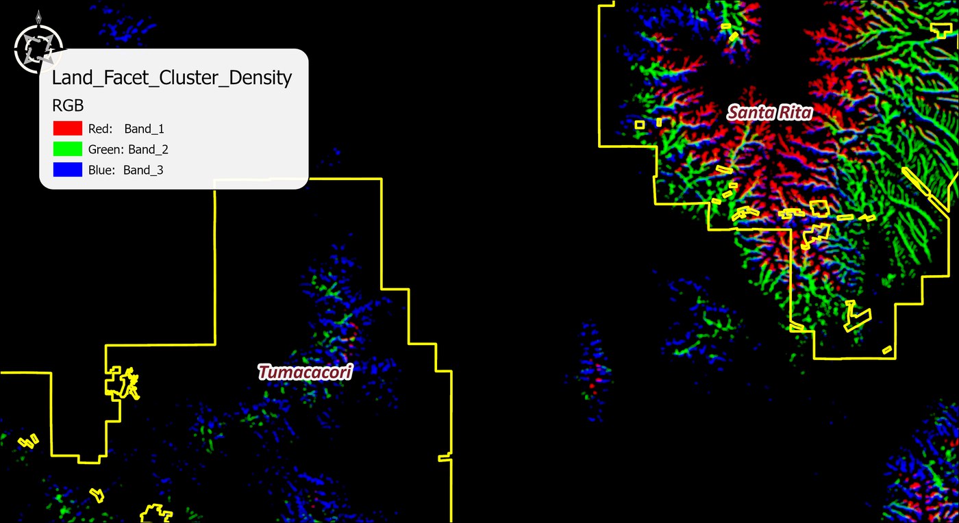 The density raster as ArcGIS first draws it: an RGB composite of bands 1, 2 and 3 on a black background, glowing blobs concentrated in the Santa Rita block with the wildland blocks outlined in yellow