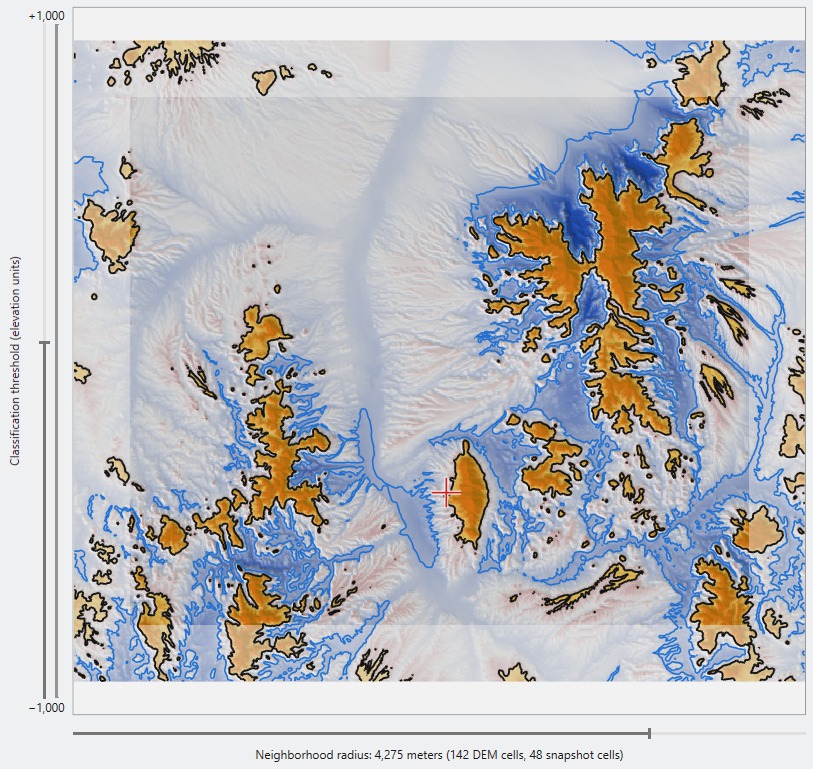 The picture at a radius of 4,275 m with the threshold line in black around the tinted ridges and mountains and a dashed blue line at minus the threshold enclosing the basins and drainages, which are deep blue around the north-eastern range and pale blue through the central valley