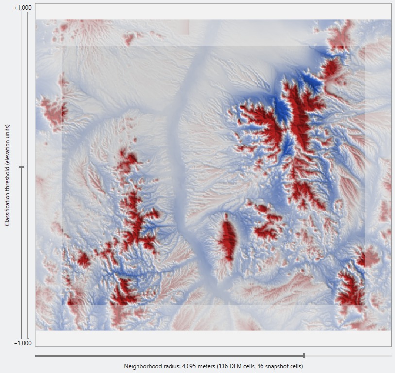 The picture with No classification at a radius of 4,095 m: deep red over the mountain ranges, blue in the basins and drainages between them, and the small mountain a solid red island in a pale basin