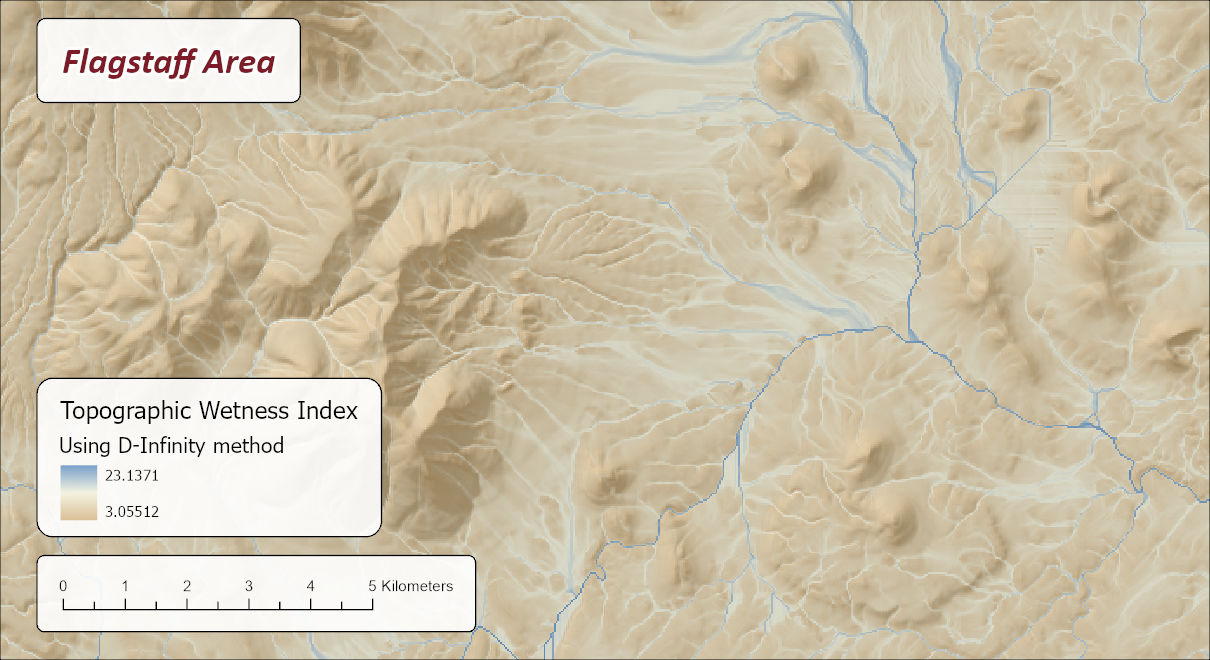 The Topographic Wetness Index using the D-Infinity method over the same area, 3.06 to 23.14: the same channels, but the ground around them grades smoothly from tan to blue, with broad soft aprons of wetter ground below the slopes and across the plain